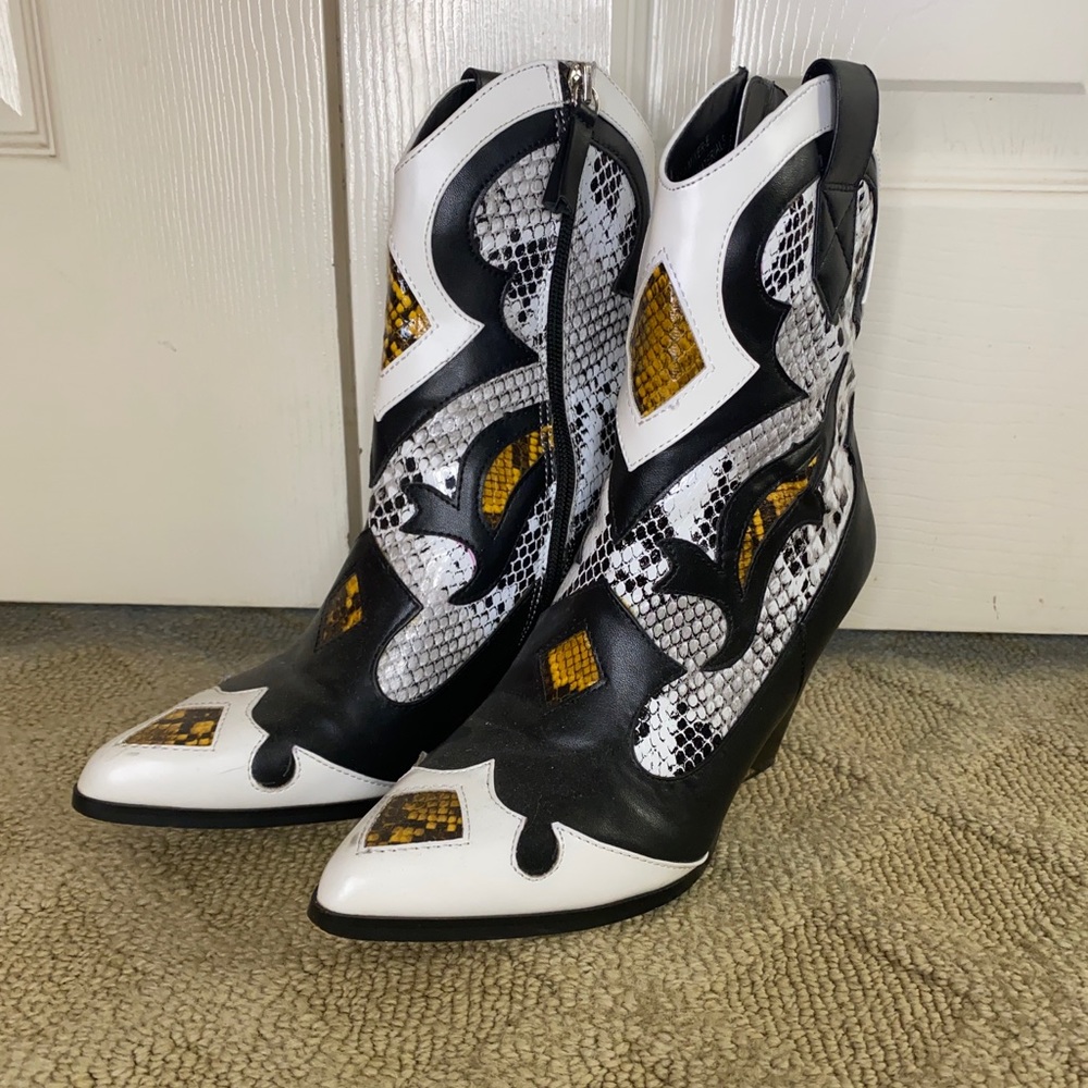 Snake pointed toe boots
